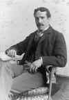 William Haworth sitting in wicker chair-B&W-Resized.jpg (71497 bytes)